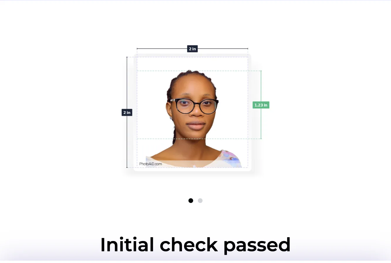 PhotoAiD showing Initial check passed for a woman wearing glasses, head measured at 1.23 inches