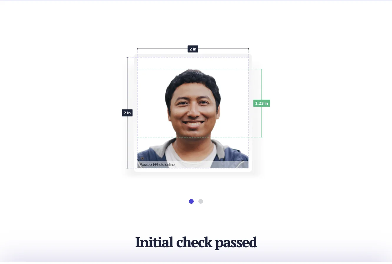Passport Photo Online showing Initial check passed for a smiling man with teeth showing