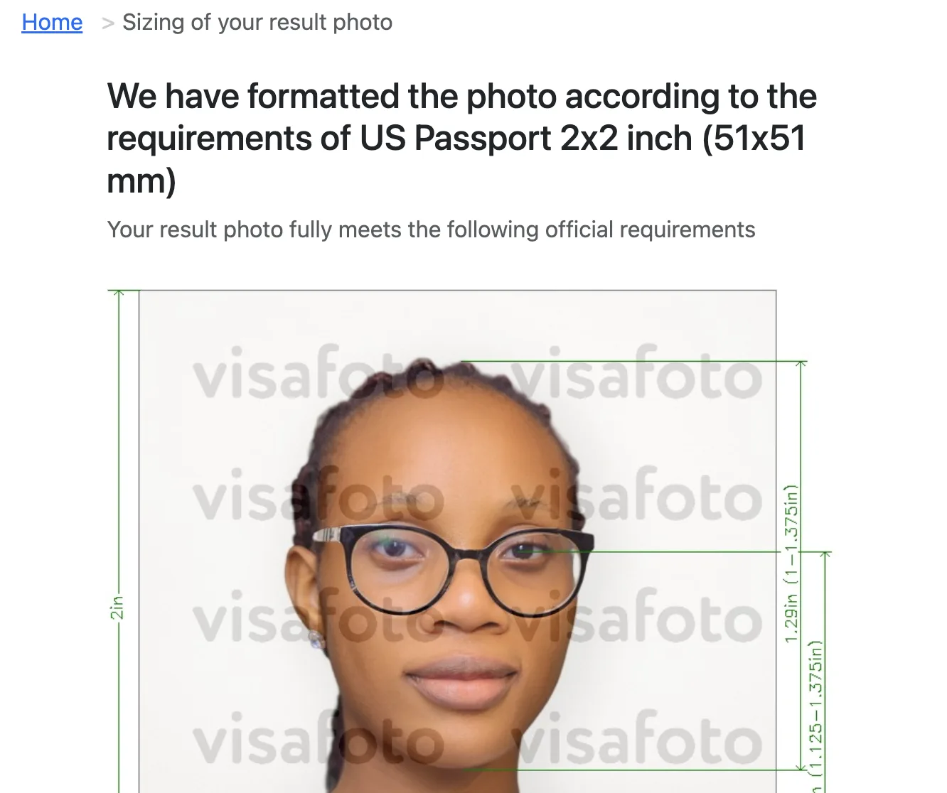 Visafoto result page saying the photo of a woman wearing glasses fully meets the official requirements